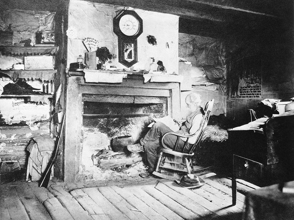 galen clark at home in front of his fireplace