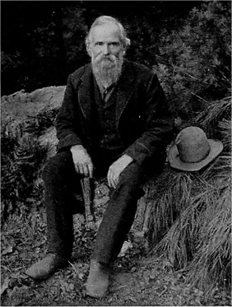 galen clark, seated on tree